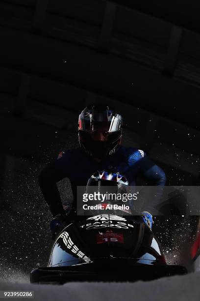 Lamin Deen, Ben Simons, Toby Olubi and Andrew Matthews of Great Britain finish their final run during the 4-man Boblseigh Heats on day sixteen of the...