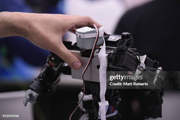 Technician works on their robots during the 32nd ROBO-ONE tournament on February 25, 2018 in Tokyo, Japan. According to the organizer, the ROBO-ONE,...