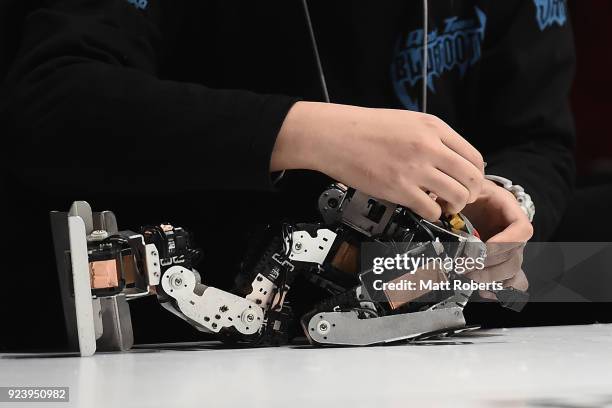 Technician works on their robots during the 32nd ROBO-ONE tournament on February 25, 2018 in Tokyo, Japan. According to the organizer, the ROBO-ONE,...