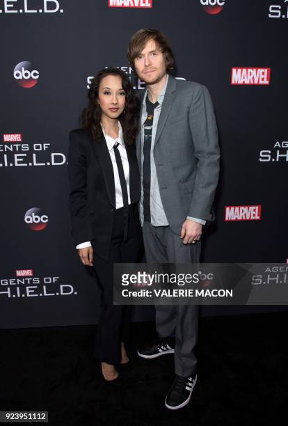 Producer Maurissa Tancharoen and Screenwriter Jed Whedon attend Marvels Agents of S.H.I.E.L.D. 100th Episode Celebration in Hollywood, California, on...