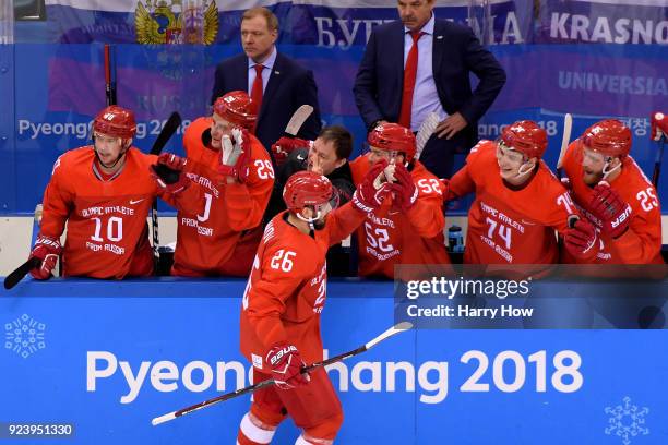 Vyacheslav Voinov of Olympic Athlete from Russia celebrates with teammates after a goal in the first period against Germany during the Men's Gold...