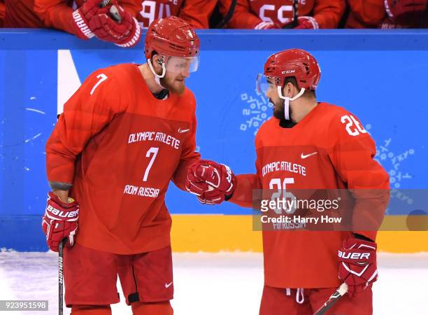 Vyacheslav Voinov of Olympic Athlete from Russia celebrates with Ivan Telegin after a goal in the first period against Germany during the Men's Gold...