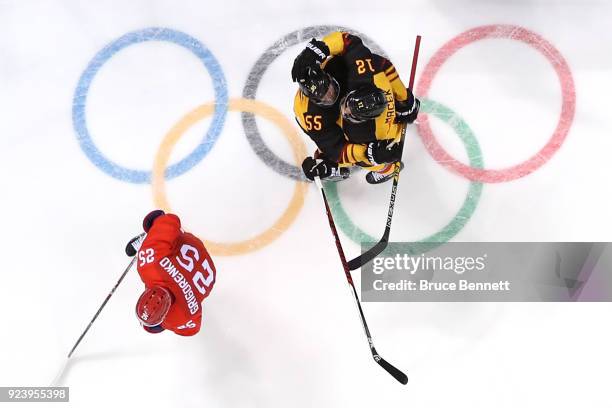 Felix Schutz of Germany celebrates with Brooks Macek after scoring a goal in the second period against Olympic Athletes from Russia during the Men's...