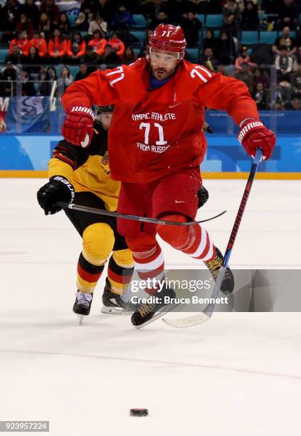 Ilya Kovalchuk of Olympic Athlete from Russia competes for the puck with Yannic Seidenberg of Germany in the second period during the Men's Gold...