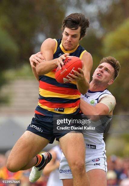 Darcy Fogarty of the Crows marks the ball during the JLT Community Series AFL match between the Adelaide Crows and the Fremantle Dockers at...