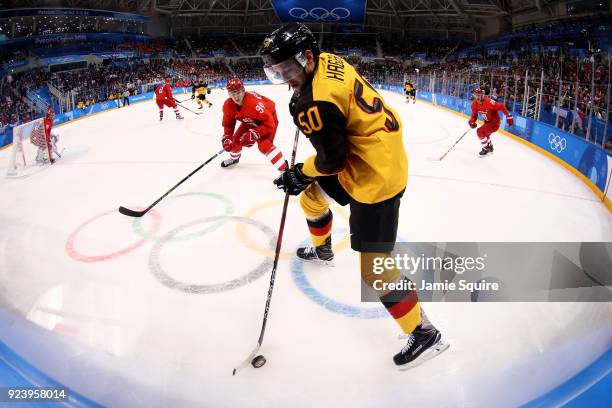 Patrick Hager of Germany controls the puck in the second period against Alexander Barabanov of Olympic Athletes from Russia during the Men's Gold...