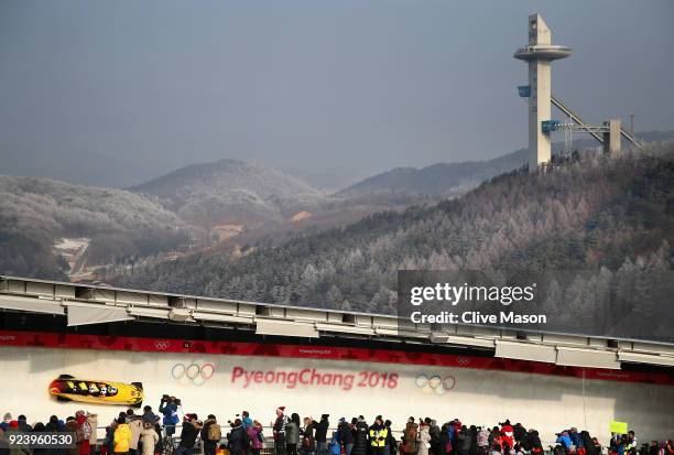 Francesco Friedrich, Candy Bauer, Martin Grothkopp and Thorsten Margis of Germany make a run during the 4-man Boblseigh Heats on day sixteen of the...