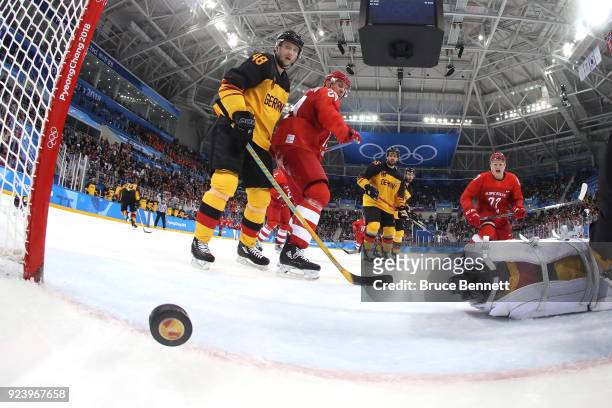 Danny Aus Den Birken of Germany allows a goal by Nikita Gusev of Olympic Athlete from Russia in the third period during the Men's Gold Medal Game on...