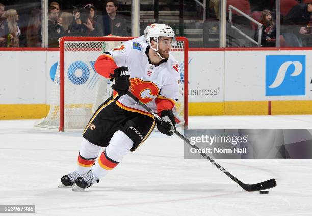 Brodie of the Calgary Flames skates the puck up ice against the Arizona Coyotes at Gila River Arena on February 22, 2018 in Glendale, Arizona.