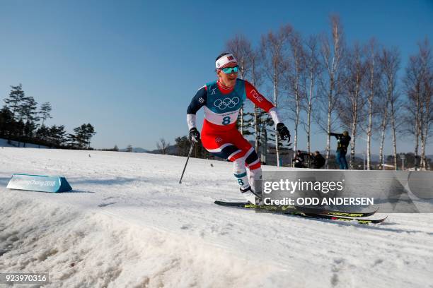 Norway's Marit Bjoergen competes during the women's 30km cross country mass start classic at the Alpensia cross country ski centre during the...