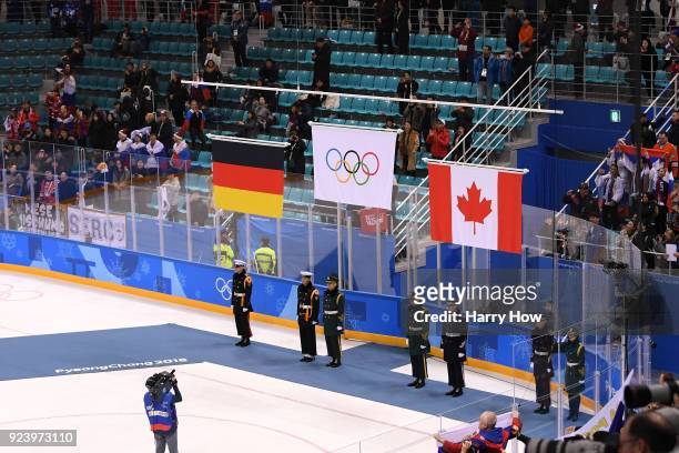 The Olympic flag is raised after gold medal winners Olympic Athletes from Russia defeated Germany 4-3 in overtime during the Men's Gold Medal Game on...