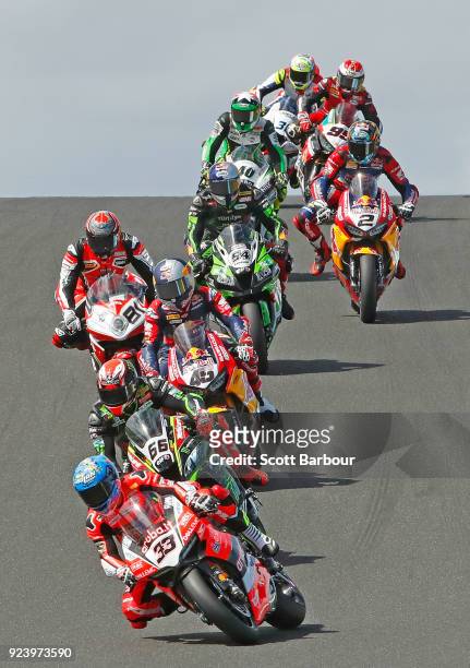 Race winner Marco Melandri of Italy and Aruba.it Racing - Ducati leads riders over Lukey heights during race 2 in the FIM Superbike World...