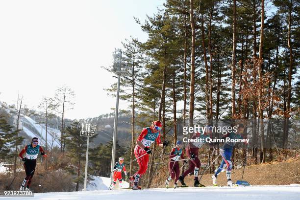 Justyna Kowalczyk of Poland, Anastasia Sedova of Olympic Athlete from Russia and Sadie Bjornsen of the United States compete during the Ladies' 30km...