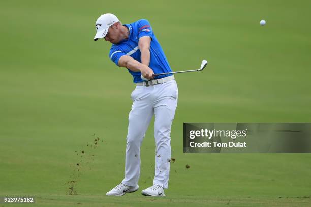 David Horsey of England hits an approach shot on the 5th hole during the final round of the Commercial Bank Qatar Masters at Doha Golf Club on...