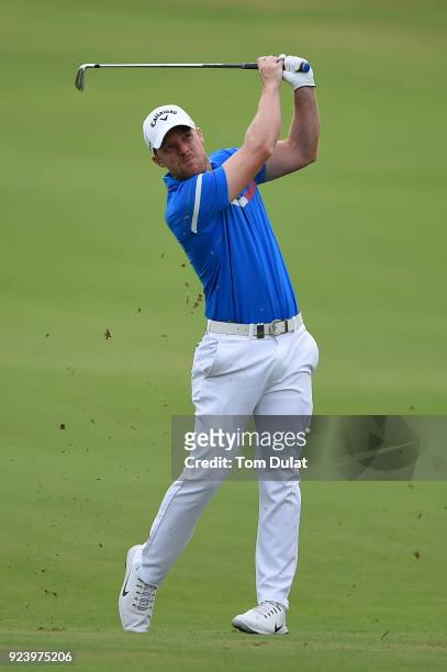 David Horsey of England hits an approach shot on the 5th hole during the final round of the Commercial Bank Qatar Masters at Doha Golf Club on...
