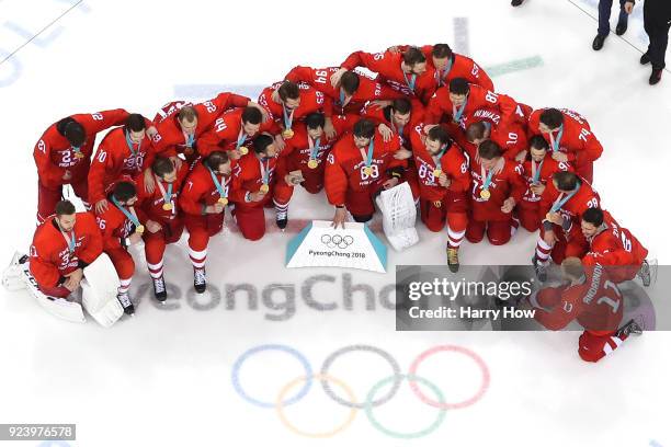 Gold medal winners Olympic Athletes from Russia celebrate during the medal ceremony after defeating Germany 4-3 in overtime during the Men's Gold...