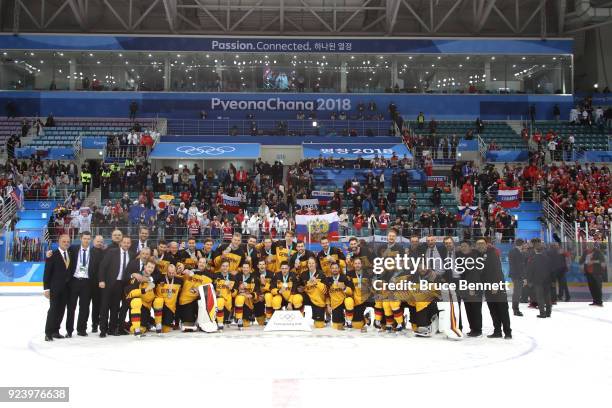 Silver medal winners Germany celebrate during the medal ceremony after being defeated by Olympic Athletes from Russia 4-3 in overtime in the Men's...