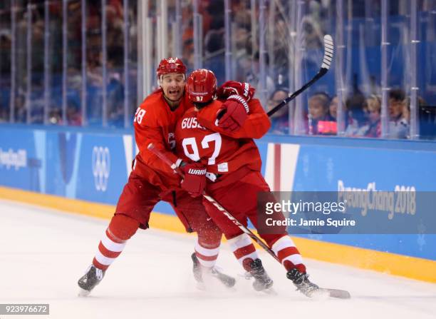 Nikita Gusev of Olympic Athlete from Russia celebrates with Andrei Zubarev after scoring the tying goal in the third period against Germany during...