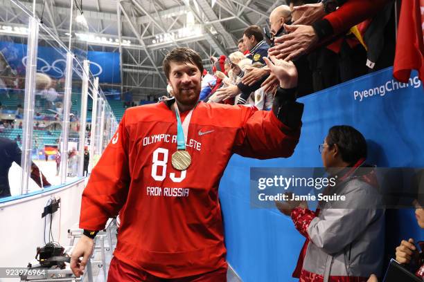 Gold medal winner Vasili Koshechkin of Olympic Athlete from Russia celebrates after defeating Germany 4-3 in overtime during the Men's Gold Medal...