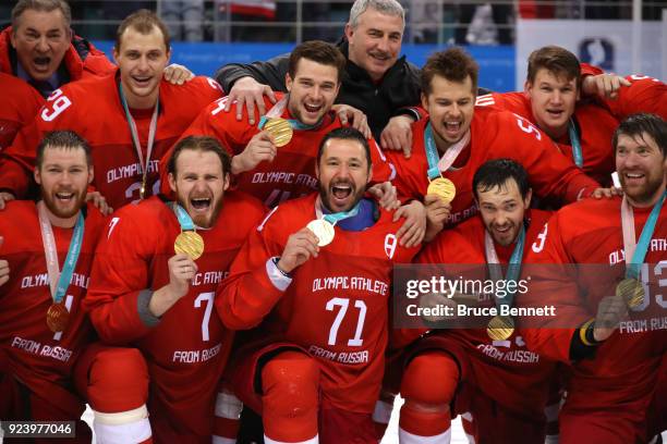 Gold medal winners Olympic Athletes from Russia celebrate during the medal ceremony after defeating Germany 4-3 in overtime during the Men's Gold...