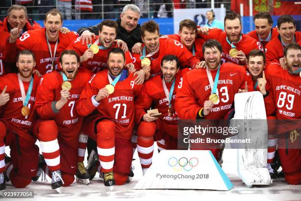 Gold medal winners Olympic Athletes from Russia celebrate during the medal ceremony after defeating Germany 4-3 in overtime during the Men's Gold...