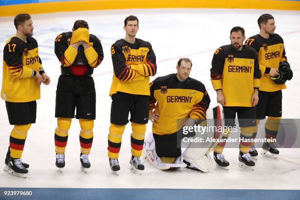 Silver medal winners Marcus Kink, Matthias Plachta, Frank Mauer, Danny Aus Den Birken, Yannic Seidenberg and Patrick Reimer of Germany look on after...