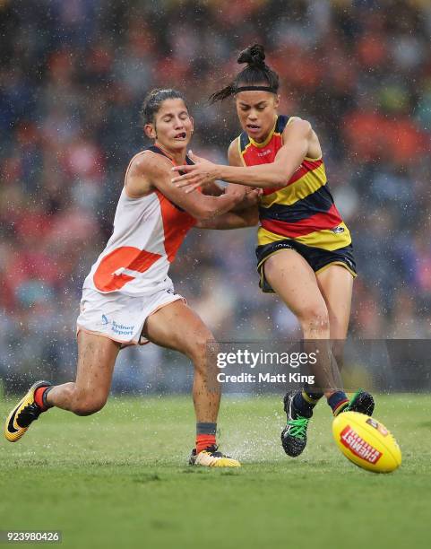 Justine Mules of the Crows competes for the ball against Jess Dal Pos of the Giants during the round four AFLW match between the Greater Western...