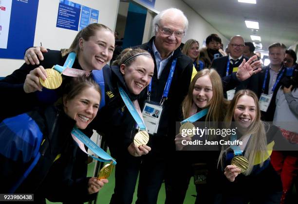 King Carl XVI Gustaf of Sweden poses with gold medalists of Team Sweden Anna Hasselborg, Sara McManus, Agnes Knochenhauer, Jennie Waahlin, Sofia...