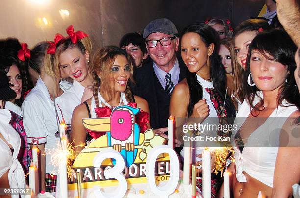 Films producer Marc Dorcel and actresses attend Les Ambassadeurs and Marc Dorcel College Party at the Pavillon Dauphine on October 16, 2009 in Paris,...