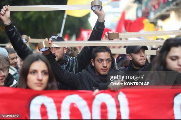 The protesters with adhesive tape in hands during the anti-fascist march in Palermo organized by the ANPI, the left forces and the social centers....