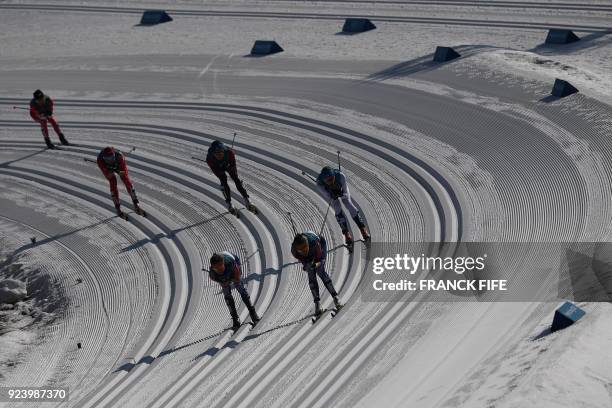 Athletes compete in the women's 30km cross country mass start classic at the Alpensia cross country ski centre during the Pyeongchang 2018 Winter...