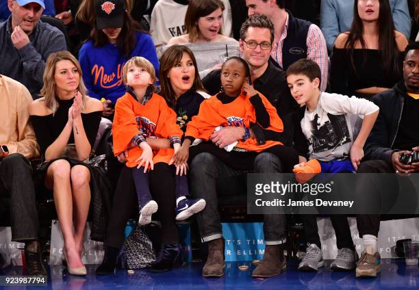 Mariska Hargitay and Peter Hermann sit courtside with children Amaya Hermann, Andrew Hermann and August Hermann at the New York Knicks vs Boston...