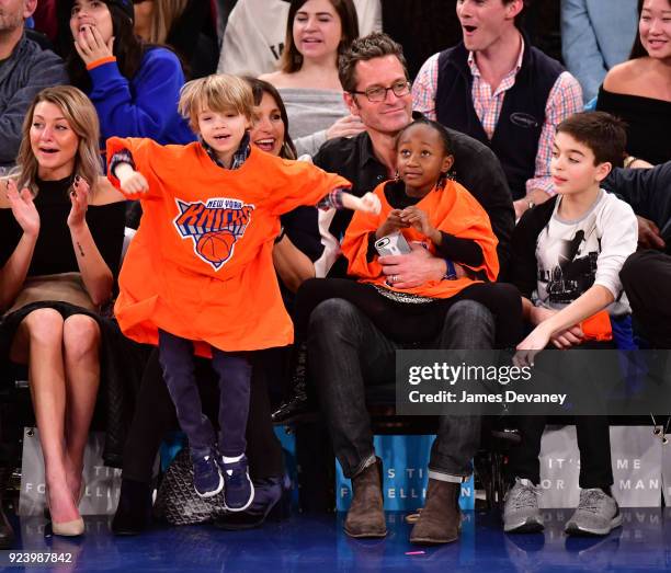 Mariska Hargitay and Peter Hermann sit courtside with children Amaya Hermann, Andrew Hermann and August Hermann at the New York Knicks vs Boston...