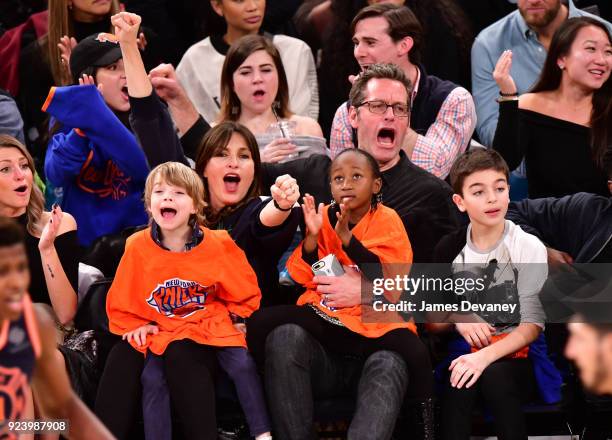 Mariska Hargitay and Peter Hermann sit courtside with children Amaya Hermann, Andrew Hermann and August Hermann at the New York Knicks vs Boston...