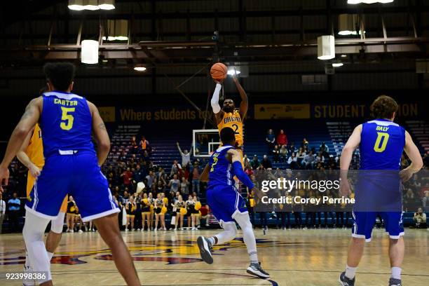 Tramaine Isabell of the Drexel Dragons hits a critical three point basket against the Delaware Fightin Blue Hens during the second half at the...