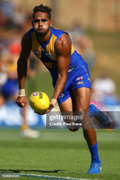 Lewis Jetta of the Eagles looks to handball during the JLT Community Series AFL match between the West Coast Eagles and the Port Adelaide Power at...