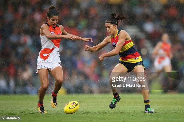 Justine Mules of the Crows competes for the ball against Jess Dal Pos of the Giants during the round four AFLW match between the Greater Western...