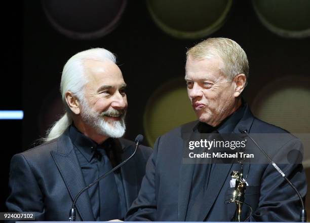 Rick Baker and Greg Cannom speak onstage during the 2018 Make-Up Artists and Hair Stylists Guild Awards held at The Novo by Microsoft on February 24,...