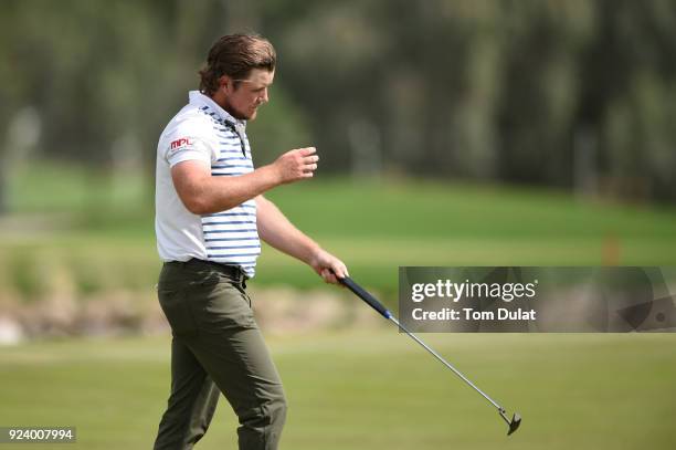 Eddie Pepperell of England reacts to his victory on the 18th green during the final round of the Commercial Bank Qatar Masters at Doha Golf Club on...