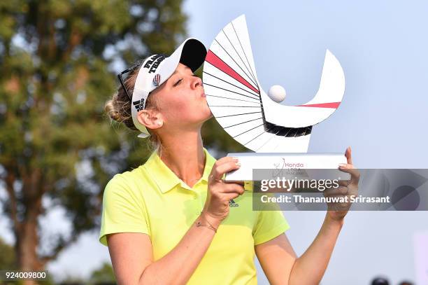 Jessica Korda of United States poses with the trophy on the 18th green after winning the Honda LPGA Thailand at Siam Country Club on February 25,...