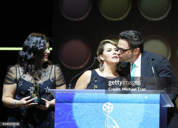 Nicki Alkire, Fernando Navarro and Stephanie Rives accept an award onstage during the 2018 Make-Up Artists and Hair Stylists Guild Awards held at The...