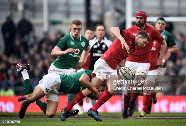 Conor Murray of Ireland and Dan Biggar of Wales during the Six Nations Championship rugby match between Ireland and Wales at Aviva Stadium on...