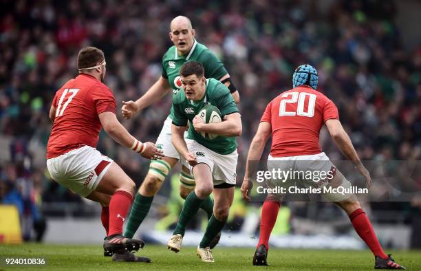 Johnny Sexton of Ireland and Justin Tipuric and Wyn Jones of Wales during the Six Nations Championship rugby match between Ireland and Wales at Aviva...