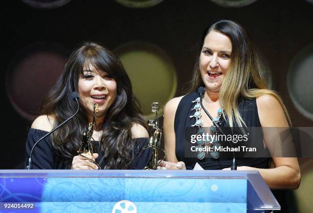 Melanie Hughes-Weaver and Judy Yonemoto, Erica Kyker accept an award onstage during the 2018 Make-Up Artists and Hair Stylists Guild Awards held at...