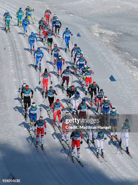 Marit Bjoergen of Norway leads the field during the Ladies' 30km Mass Start Classic on day sixteen of the PyeongChang 2018 Winter Olympic Games at...