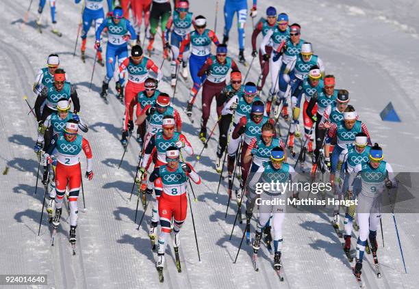 Marit Bjoergen of Norway leads the field during the Ladies' 30km Mass Start Classic on day sixteen of the PyeongChang 2018 Winter Olympic Games at...