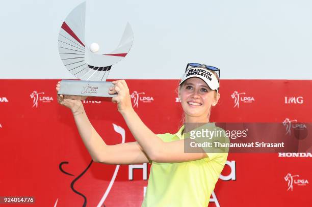 Jessica Korda of United States poses with the trophy on the 18th green after winning the Honda LPGA Thailand at Siam Country Club on February 25,...