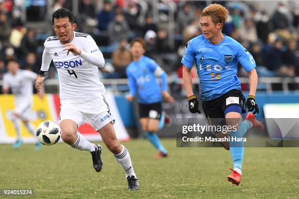 Jeong Chung Geun of Yokohama FC and Masaki Iida of Matsumoto Yamaga compete for the ball during the J.League J2 match between Yokohama FC and...