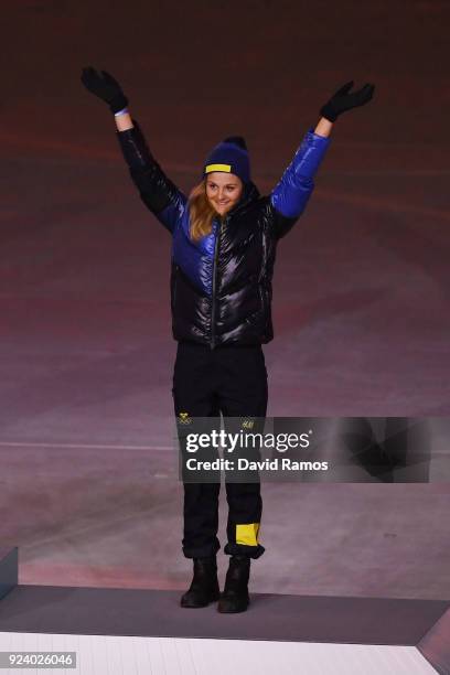 Bronze medalist Stina Nilsson of Sweden poses during the medal ceremony for the Cross-Country Skiing - Ladies' 30km Mass Start Classic during the...