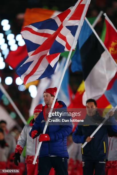 Flag bearer Billy Morgan of Great Britain walks in the Parade of Athletes during the Closing Ceremony of the PyeongChang 2018 Winter Olympic Games at...